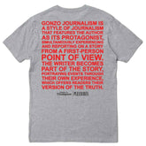 PLEASURES Badge T-Shirt at Gravity NYC